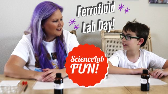 Christin running the ferrofluid science lab with a young helper